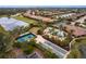 Resort-style community with pool, tennis, bocce ball, and picturesque landscaping, all surrounded by serene lakes at 5814 Cavano Dr, Sarasota, FL 34231