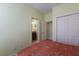 Comfortable bedroom featuring double closets and easy access to the bathroom at 5814 Cavano Dr, Sarasota, FL 34231