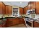 Well-equipped kitchen with stainless steel appliances and granite countertops at 5814 Cavano Dr, Sarasota, FL 34231