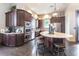 A communal kitchen with stainless steel appliances and a large island with barstool seating for easy entertaining at 5814 Cavano Dr, Sarasota, FL 34231