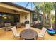 Covered patio featuring an outdoor dining area and cozy seating, great for entertaining at 5814 Cavano Dr, Sarasota, FL 34231