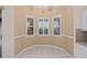 Charming breakfast nook with three windows providing ample natural light and tile flooring at 6211 Skyward Ct, Bradenton, FL 34203