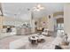 Inviting living area with open floor plan, bar seating, and contemporary furnishings at 6211 Skyward Ct, Bradenton, FL 34203