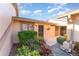 Inviting entrance with lush landscaping and decorative touches create a warm welcome to the home at 6314 29Th W Ave, Bradenton, FL 34209