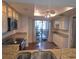 Kitchen featuring granite countertops, stainless steel appliances, and a beautiful porch view at 6430 Sun Eagle Ln # 201, Bradenton, FL 34210