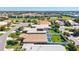 Lovely neighborhood featuring single-Gathering homes with screened pools and golf course views at 1364 Berkshire Ct, Venice, FL 34292