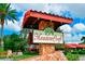 Welcome to Meadowcroft sign with lush landscaping at 1430 57Th W St # 1430, Bradenton, FL 34209