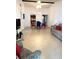 Inviting living room with tile flooring, dining area, and comfortable seating arrangement at 1430 57Th W St # 1430, Bradenton, FL 34209