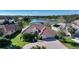 Stunning waterfront home with lush landscaping, spacious driveway and beautiful terracotta tile roof at 146 Willow Bend Way, Osprey, FL 34229