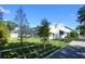 Building exterior with blue accents surrounded by lush landscaping and walkway at 2254 Hawthorne St, Sarasota, FL 34239