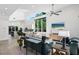 Bright, open living room features high ceilings, large windows, and stylish, modern decor at 2254 Hawthorne St, Sarasota, FL 34239