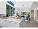 Open living area featuring large windows, modern furnishings, and plenty of natural light at 2254 Hawthorne St, Sarasota, FL 34239