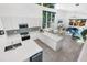 Open-concept living space with a kitchen island, bright lighting, and an open floor plan at 2254 Hawthorne St, Sarasota, FL 34239