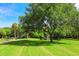 Relaxing park featuring a serene pond and fountain at 2254 Hawthorne St, Sarasota, FL 34239