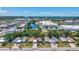Scenic aerial view of the home's location, highlighting proximity to local businesses and a water tower at 2321 Terry Ln, Sarasota, FL 34231
