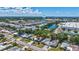 Aerial view of the property, ideally located near local amenities and a picturesque lake at 2321 Terry Ln, Sarasota, FL 34231