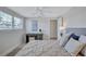 Serene bedroom featuring a desk, neutral decor, and bright natural light at 2321 Terry Ln, Sarasota, FL 34231