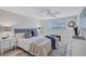 Serene bedroom with a plush bed, neutral decor, and a tranquil ambiance for restful nights at 2321 Terry Ln, Sarasota, FL 34231