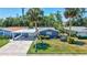 Charming single-story home with a well-maintained front yard and convenient carport at 2321 Terry Ln, Sarasota, FL 34231