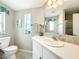 Bathroom with vanity, mirror and decorative accessories at 2601 Gulf N Dr # 427, Bradenton Beach, FL 34217