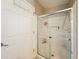 Bathroom shower stall with glass door at 2601 Gulf N Dr # 427, Bradenton Beach, FL 34217