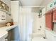This is a cozy bathroom with a shower-tub, decorative accents, and neutral colors at 2601 Gulf N Dr # 427, Bradenton Beach, FL 34217