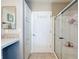 Bathroom with cabinets and view to shower stall at 2601 Gulf N Dr # 427, Bradenton Beach, FL 34217