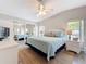 Inviting bedroom featuring a king-size bed, mirrored closet, and plenty of natural light at 2601 Gulf N Dr # 427, Bradenton Beach, FL 34217