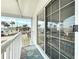 This is a porch with a view of the community, street, and waterway at 2601 Gulf N Dr # 427, Bradenton Beach, FL 34217