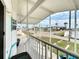 This is a porch with views of the community, street, and waterway at 2601 Gulf N Dr # 427, Bradenton Beach, FL 34217