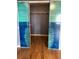 Ocean painting on unique sliding closet doors at 2950 Viscaya Pl # 205, Sarasota, FL 34237