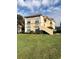 Beautiful two-story condo with well-manicured lawn and lush landscaping at 2950 Viscaya Pl # 205, Sarasota, FL 34237