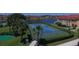 Tennis court in a condo community with water and building views at 2950 Viscaya Pl # 205, Sarasota, FL 34237