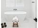 Modern bathroom with freestanding tub and stylish fixtures at 3598 Trinity St, North Port, FL 34291