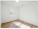 Bedroom with lots of light, features modern flooring and a window with plantation shutters at 3598 Trinity St, North Port, FL 34291