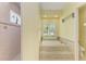 Elegant bathroom featuring a soaking tub and a glass-enclosed shower at 5304 96Th E St, Bradenton, FL 34211