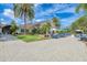 Spacious clubhouse exterior includes an outdoor patio area with tables and chairs for dining at 5304 96Th E St, Bradenton, FL 34211