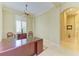Well-lit foyer with ceiling fan and view of an arched hallway at 5304 96Th E St, Bradenton, FL 34211
