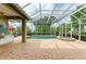 The screened-in lanai features a swimming pool and spa, providing a private and relaxing outdoor experience at 5304 96Th E St, Bradenton, FL 34211