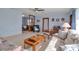 Cozy living room featuring wood accents and a living room-dining room combination layout at 5808 13Th Street E Ct, Bradenton, FL 34203