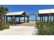 Inviting entrance to Anna Maria City Pier, offering scenic views of the beach and turquoise water at 609 Foxworth Ln, Holmes Beach, FL 34217