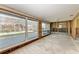 Living room being remodeled, with large windows overlooking screened pool area at 609 Foxworth Ln, Holmes Beach, FL 34217