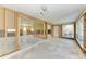 Living room being remodeled with large windows for plenty of natural light at 609 Foxworth Ln, Holmes Beach, FL 34217