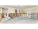 Large living space with a ceiling fan, ready to be renovated to your preferences at 609 Foxworth Ln, Holmes Beach, FL 34217