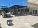Inviting outdoor seating area with stylish furniture, perfect for relaxing at the golf club at 609 Foxworth Ln, Holmes Beach, FL 34217