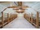 Unfinished attic space featuring exposed beams and spray foam insulation at 656 Tropical Cir, Sarasota, FL 34242