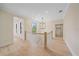 Upstairs hallway features hardwood floors, modern lighting, and natural light at 656 Tropical Cir, Sarasota, FL 34242