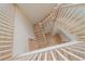 Aerial view of staircase showing wood floors and light railing at 656 Tropical Cir, Sarasota, FL 34242