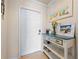 Charming entryway with a decorative table, artwork, and a welcoming atmosphere at 7149 River Hammock Dr # 101, Bradenton, FL 34212