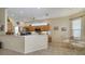 Open kitchen featuring a breakfast bar and stainless steel appliances at 92 Tall Trees Ct, Sarasota, FL 34232